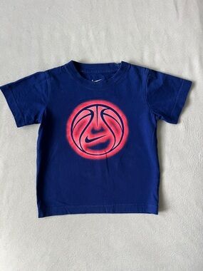 Nike Kids Blue Tee with Neon Pink Basketball Graphic